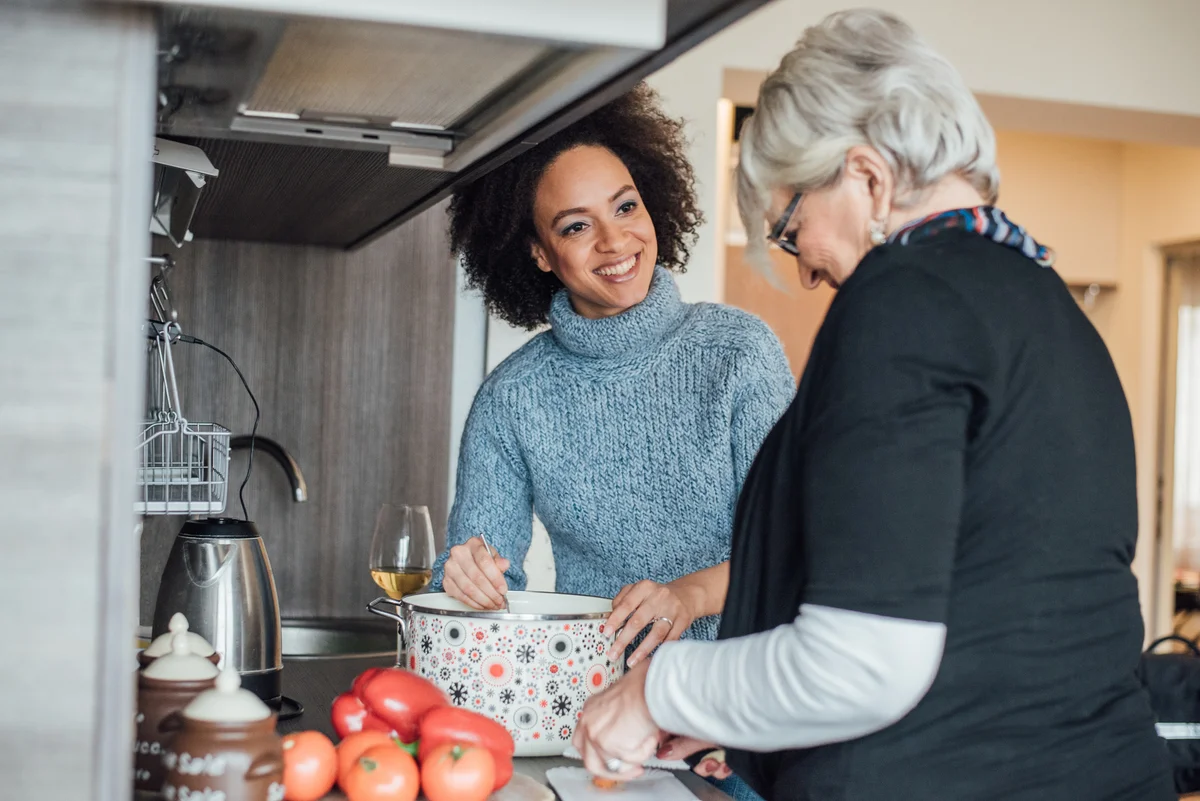 daughter-in-law and mother-in-law cooking together