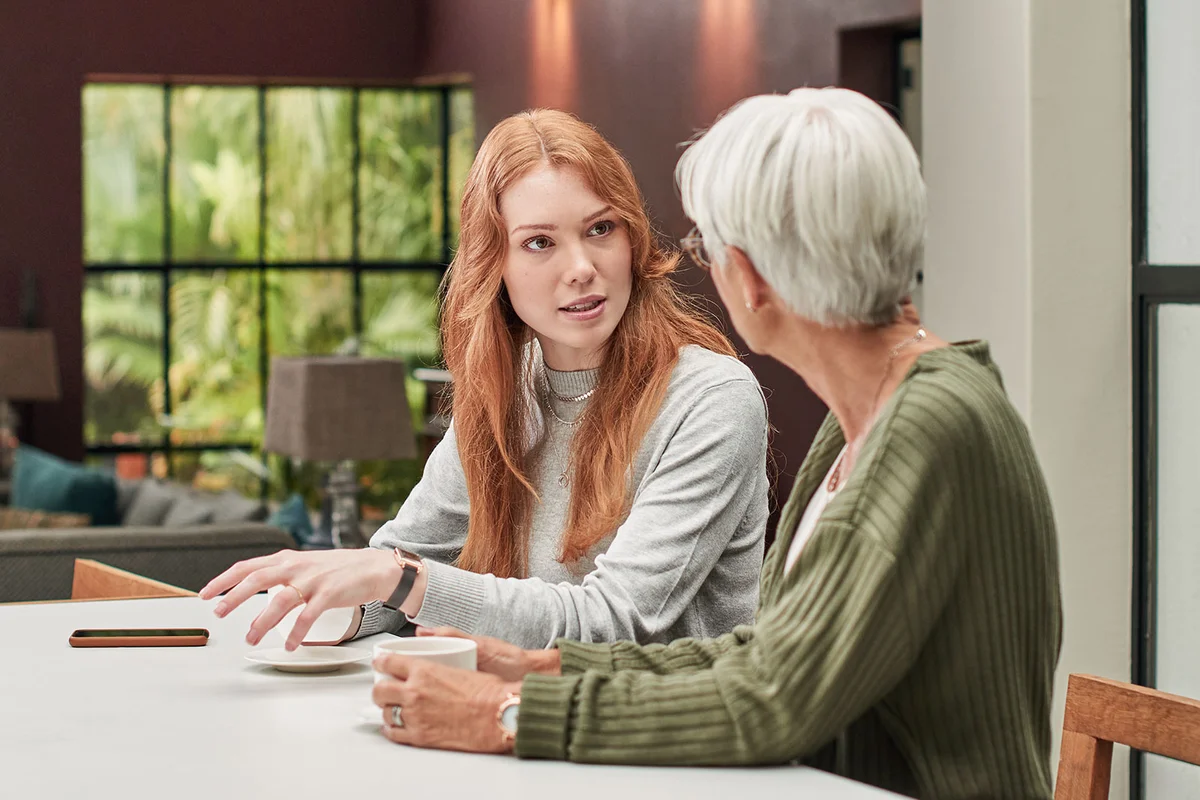 mother and daughter having serious conversation