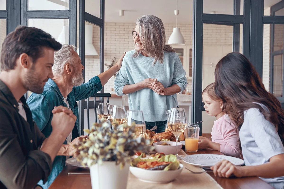 Multi-generation family in a thanksgiving dinner