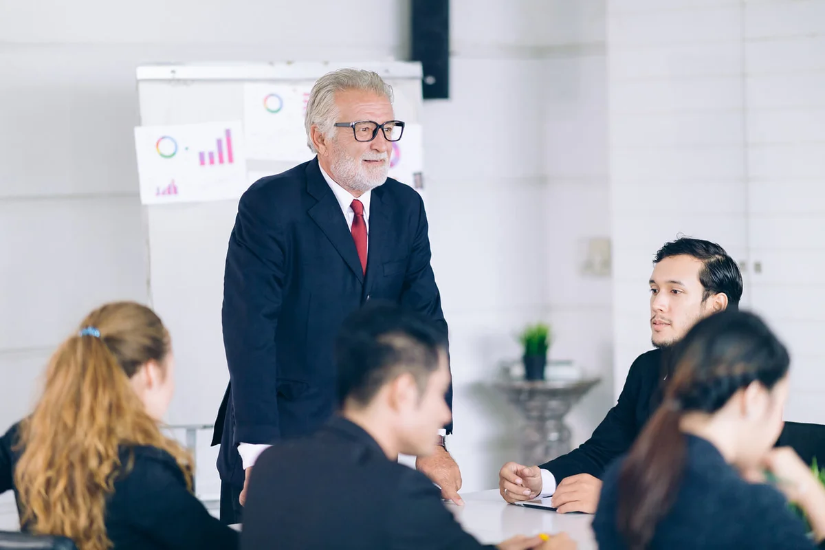 Business People At Meeting In Office