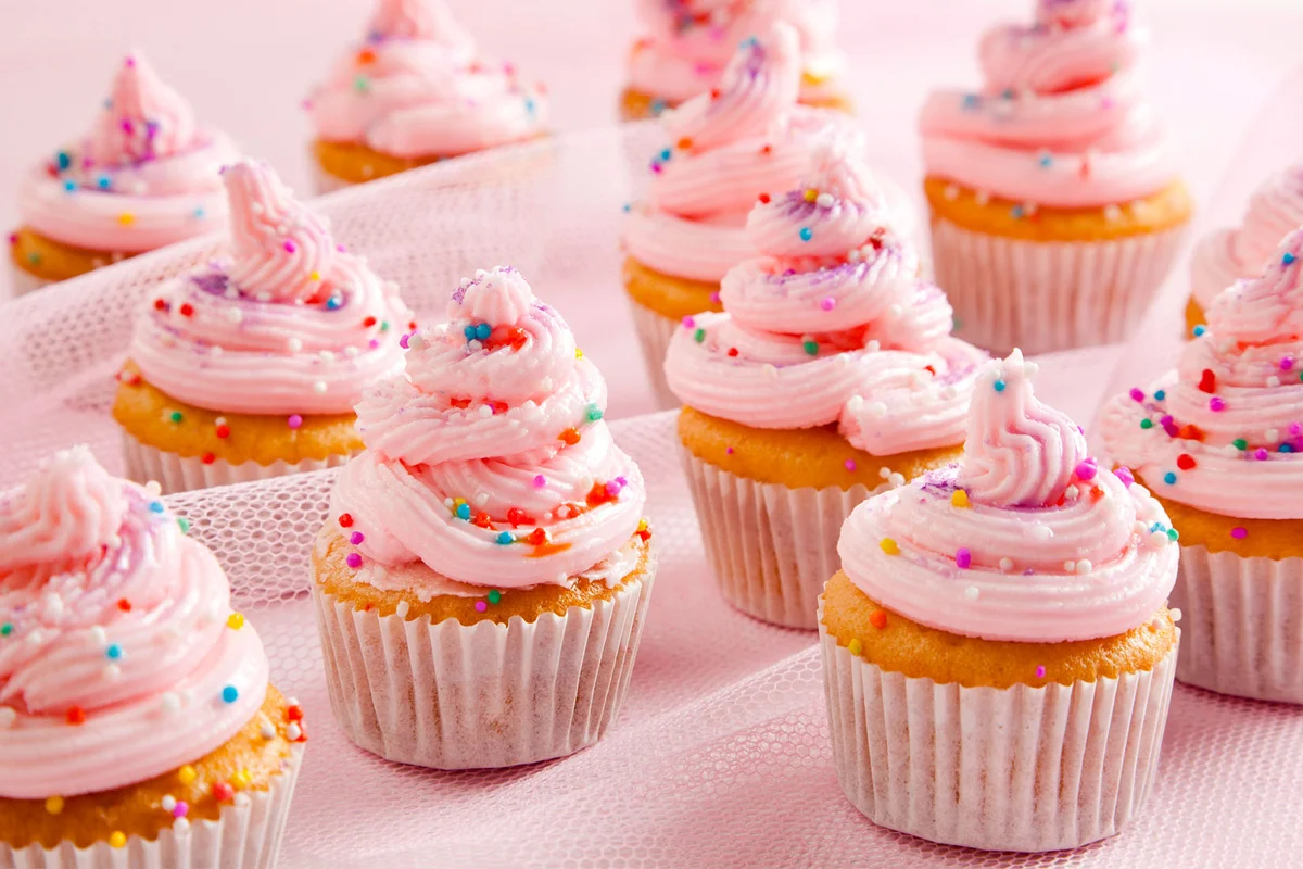 pink cupcakes with sprinkles