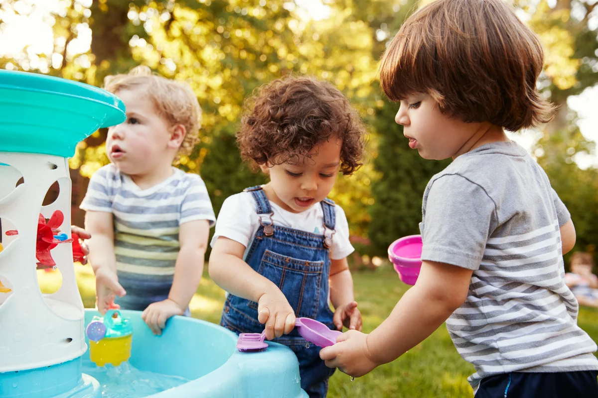 toddlers playing together outside