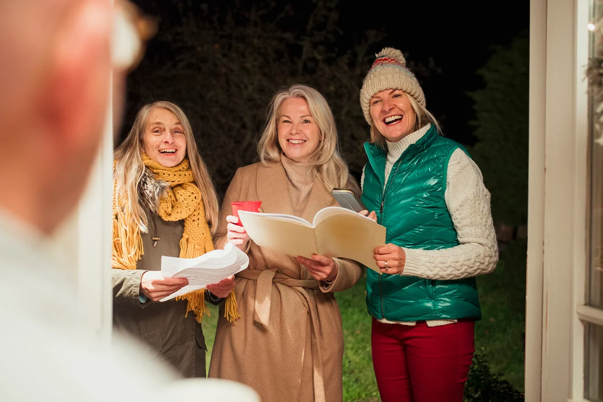 Group women Christmas carol