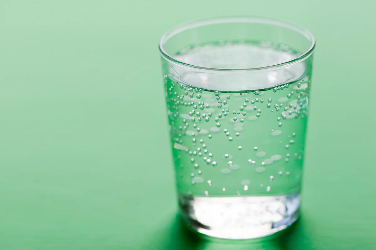Club Soda on green background