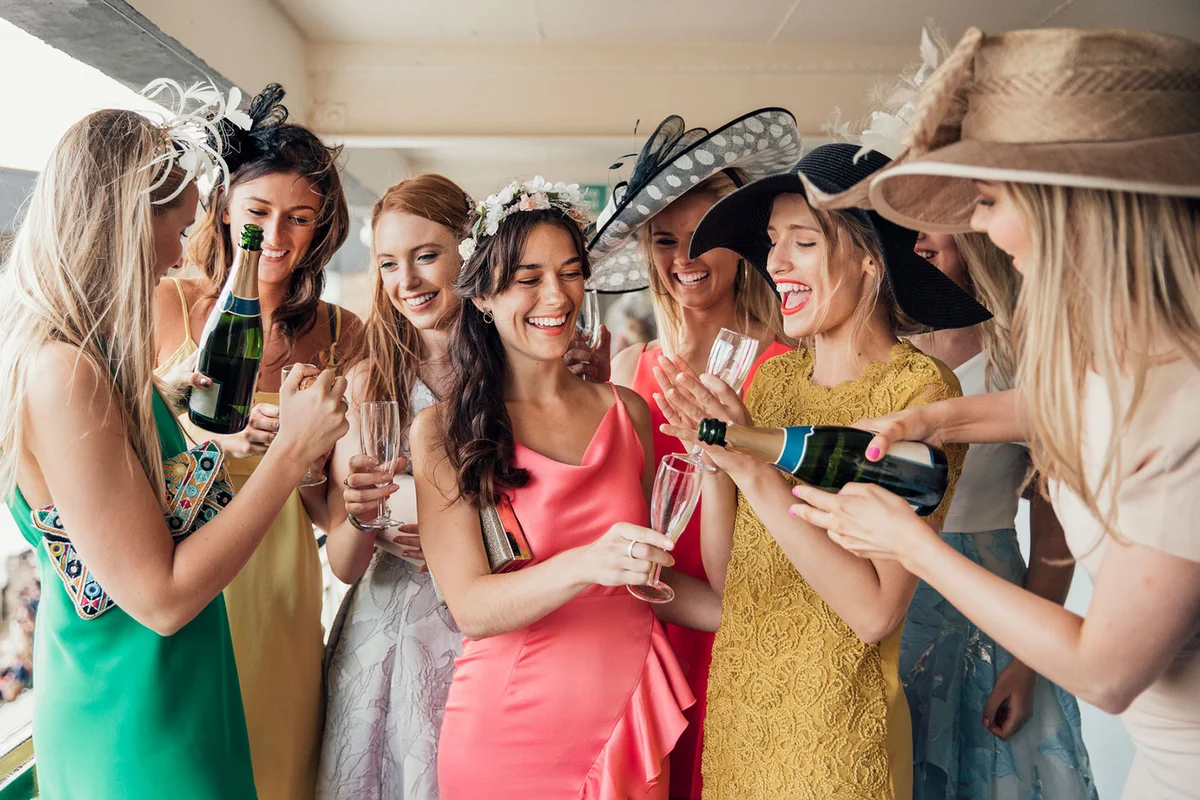 group of women dressed up for the crown party