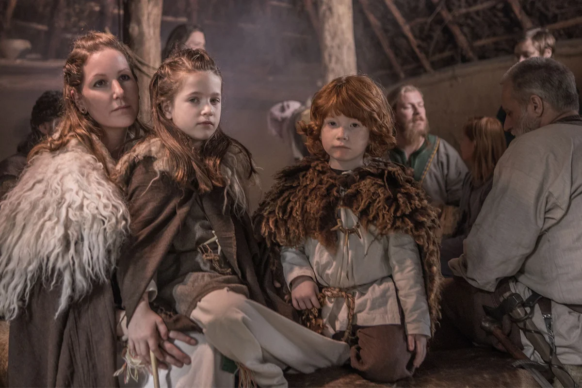 Viking family in their house
