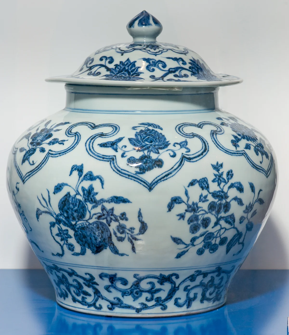 Antique Chinese Ming blue and white wine jar on display