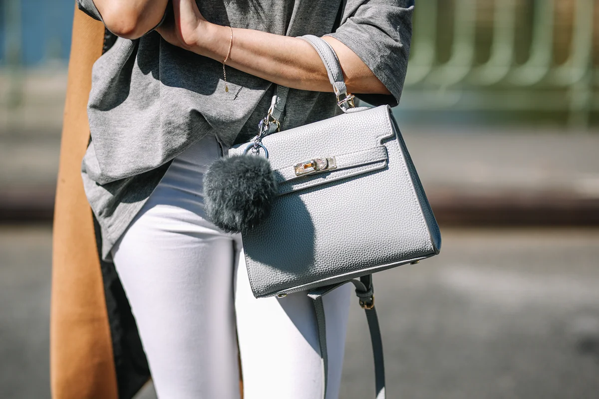 Gray Aliexpress bag with a pompom- Getty Editorial Use