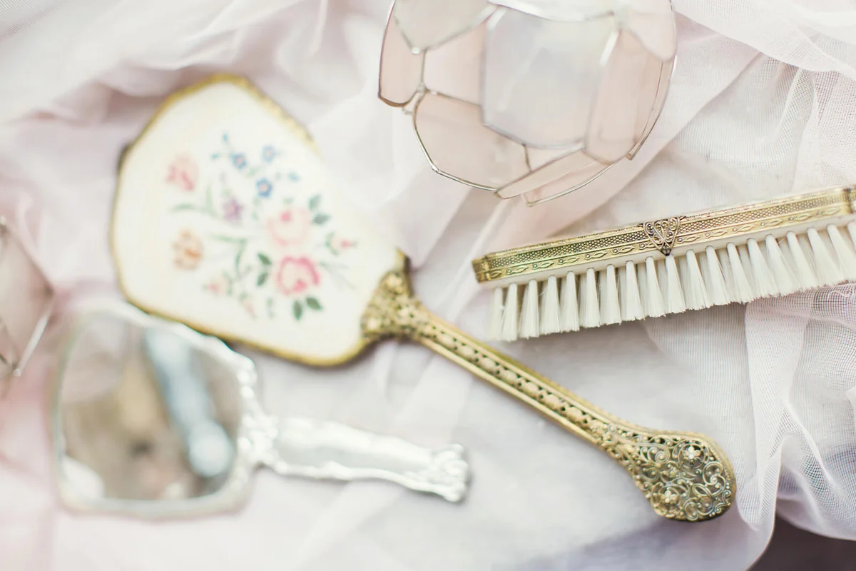 Vintage hand mirror and hairbrush