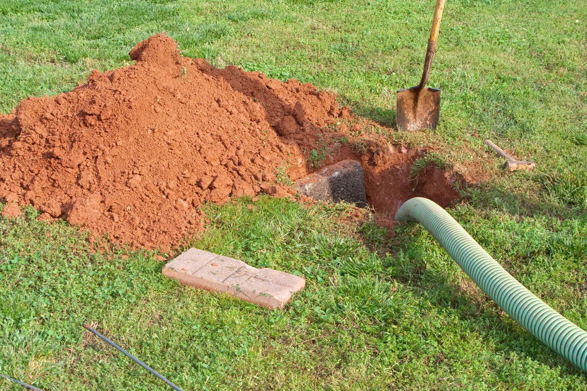 Open Septic Tank In Yard While Bring Pumped Out