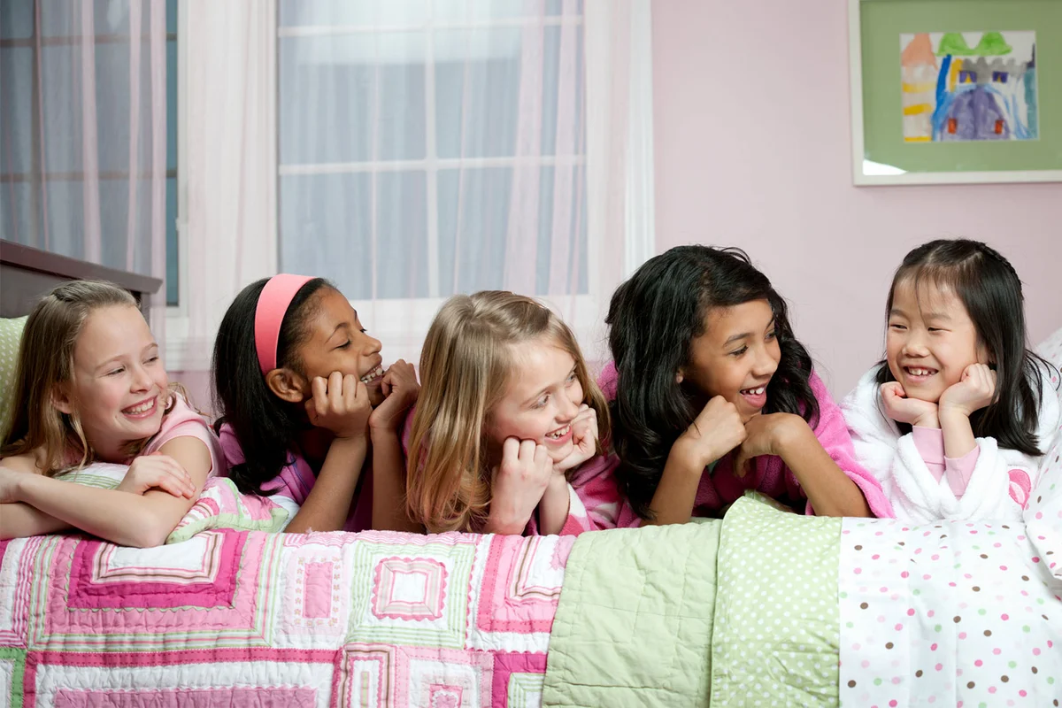 girls having fun at sleepover party