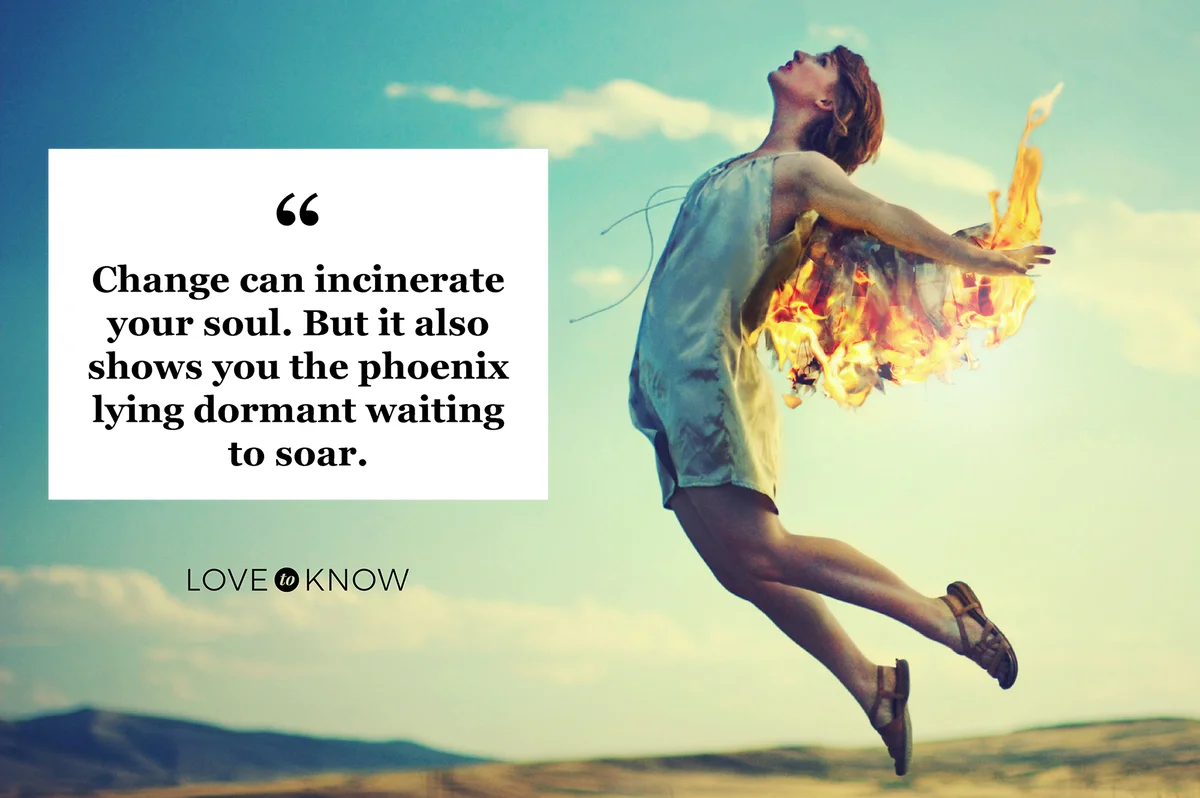 Woman is fiery wings rising against a turquoise sky