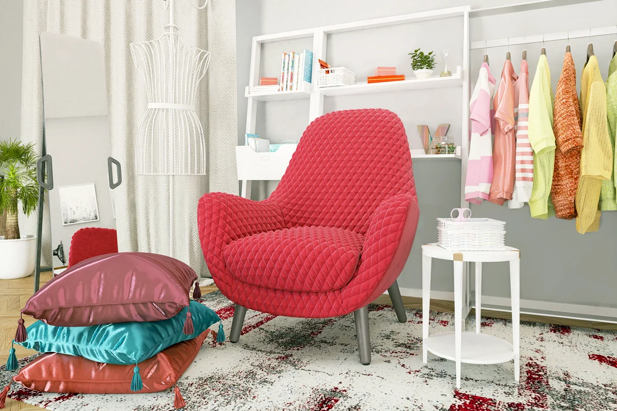 Sewing room with red armchair