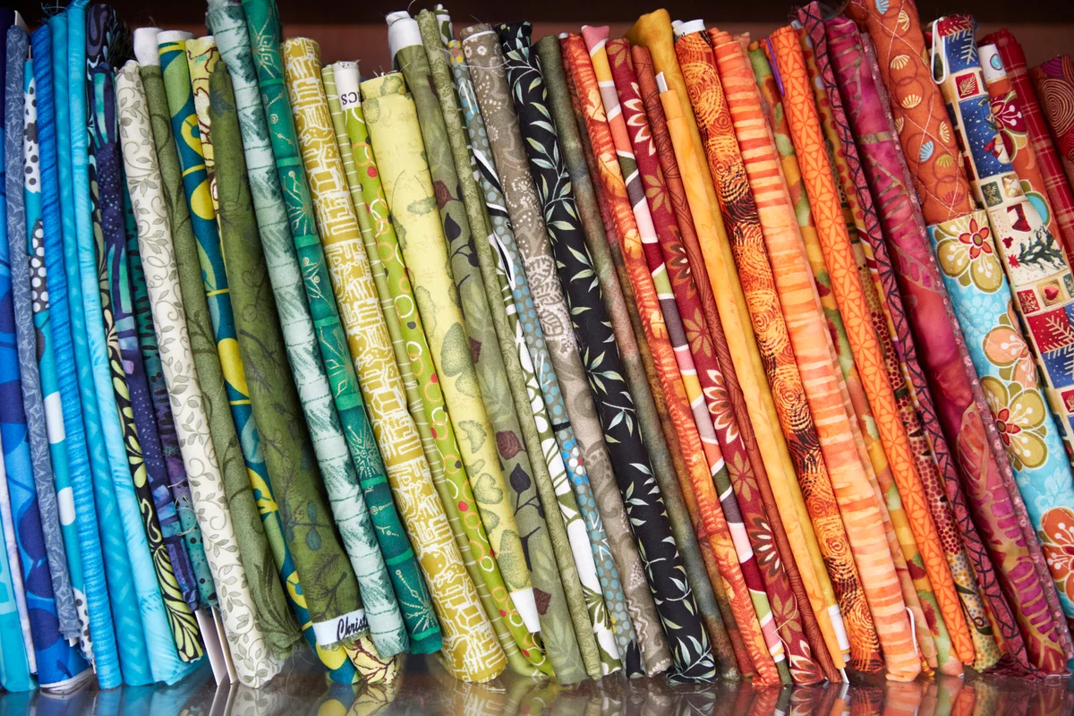 Sewing fabric stored on a shelf