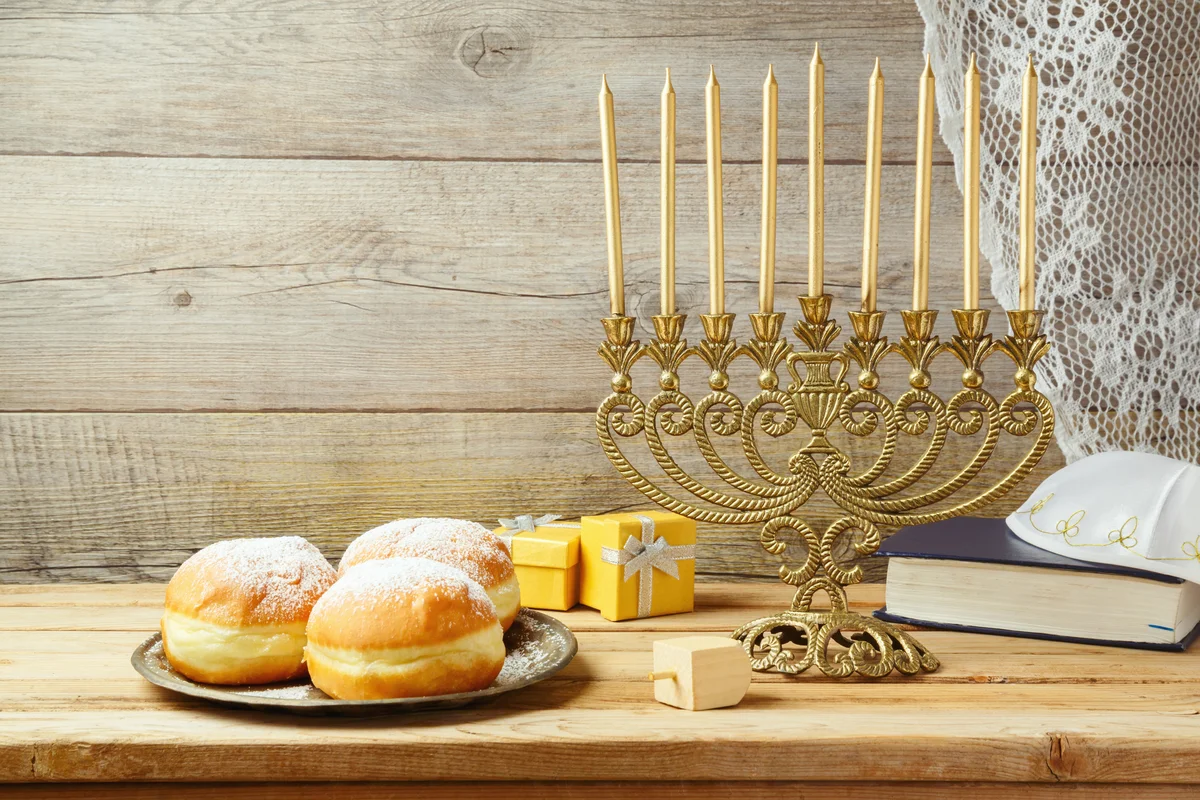 vintage gold tone menorah with sufganiyah, gift box and dreidel
