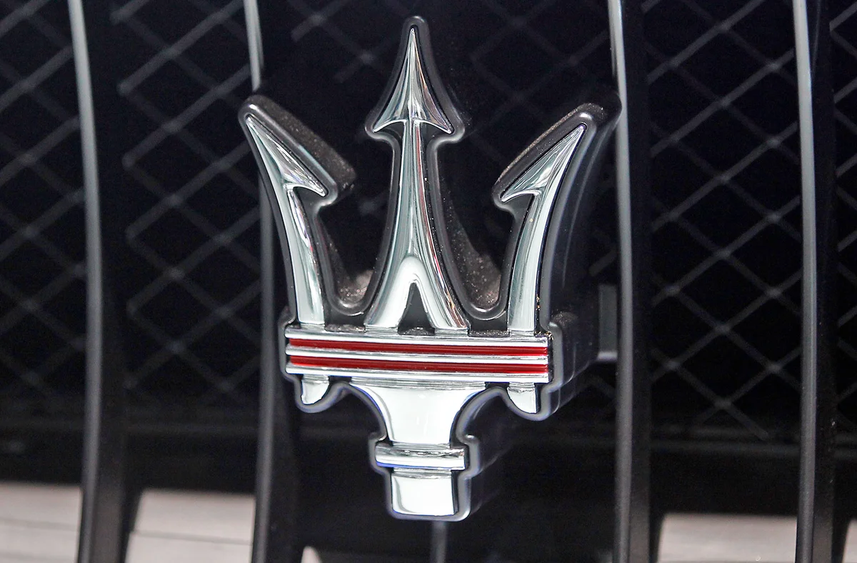 Maserati badge on grille of car