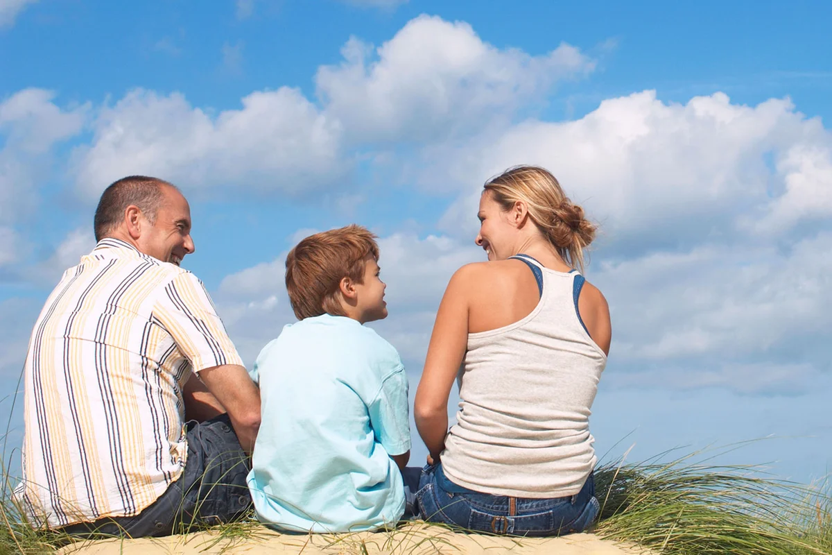 family looking at clouds together