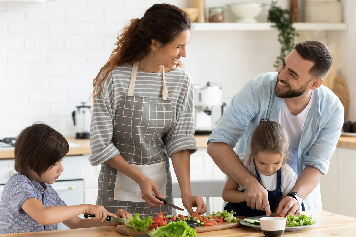 family making recipe together in kitchen