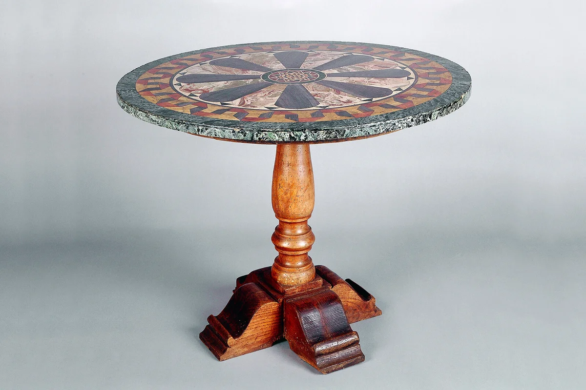 Round table with inlaid marble top, diameter 90 cm, Vertemate Franchi Palace, Lombardy, Italy | Getty Editorial Use