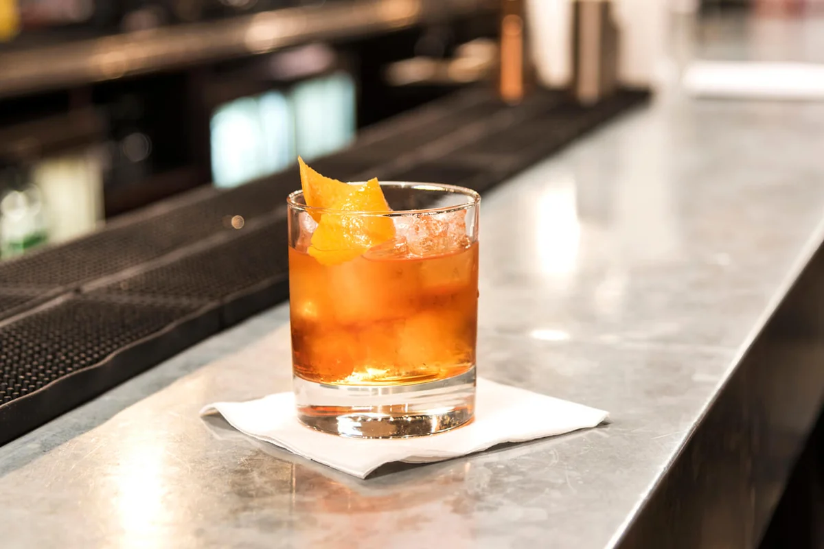 Old fashioned cocktail on the bar