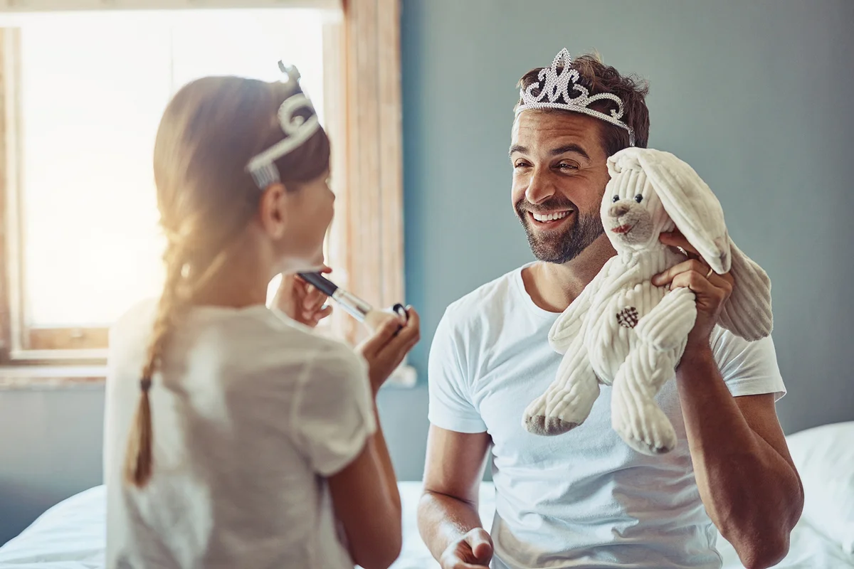 Shot of an adorable little girl spending time with her father at home