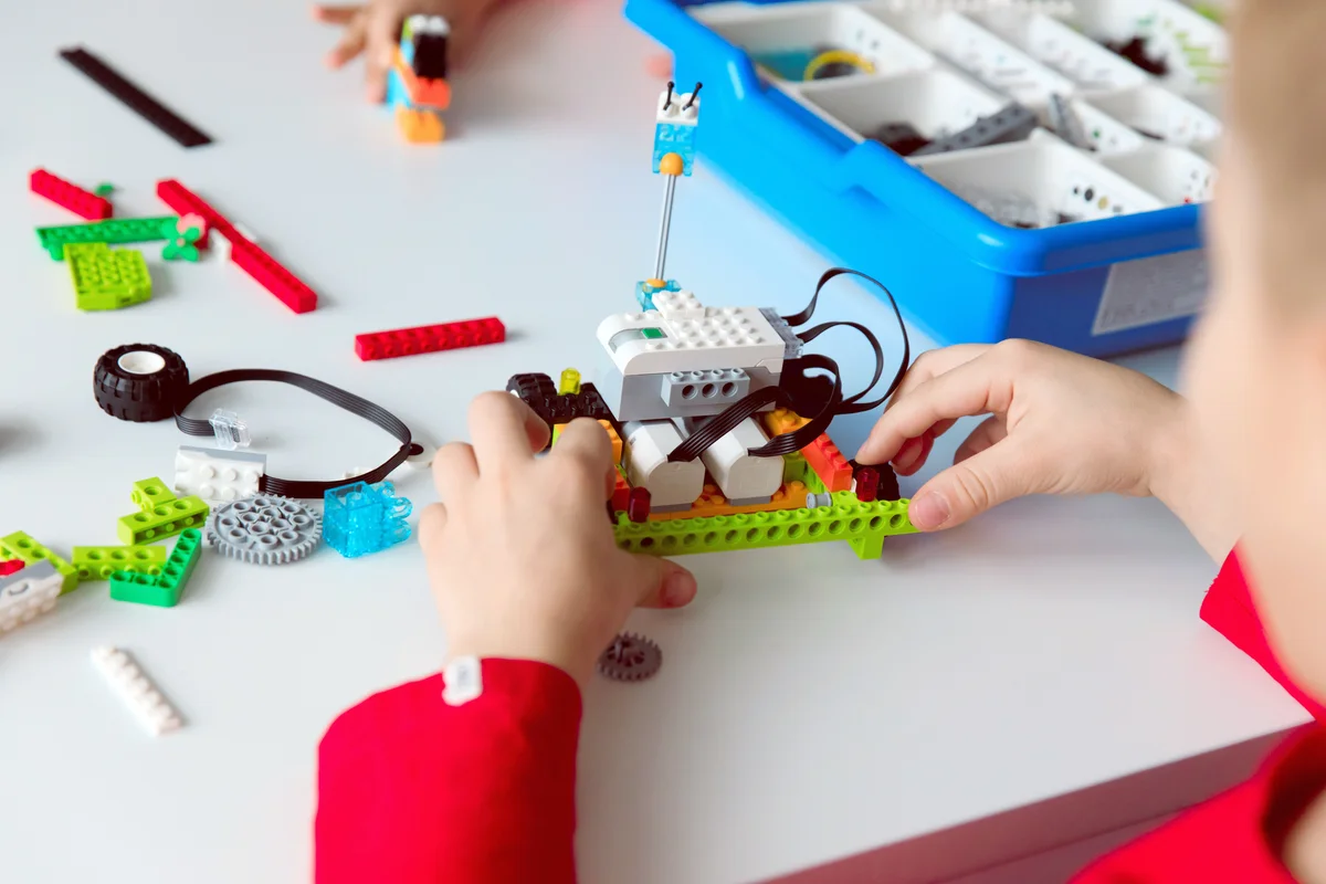 Kids playing with lego