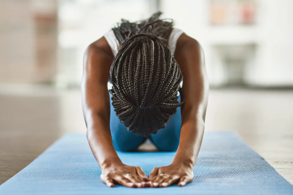 Young woman practicing yoga