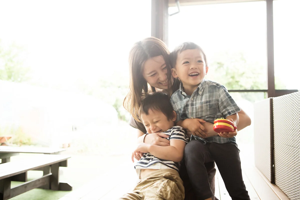 Mother and son playing together