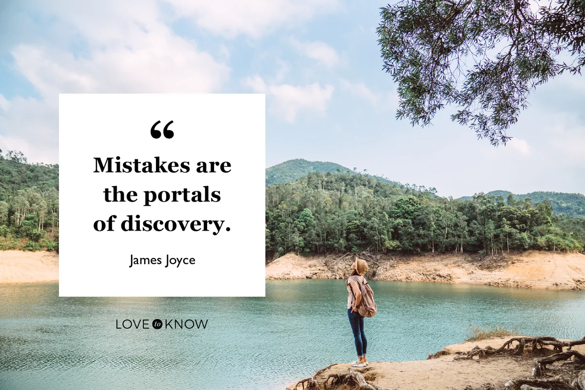 Young pretty woman enjoying a scenic beautiful lake view joyfully while hiking on nature trail
