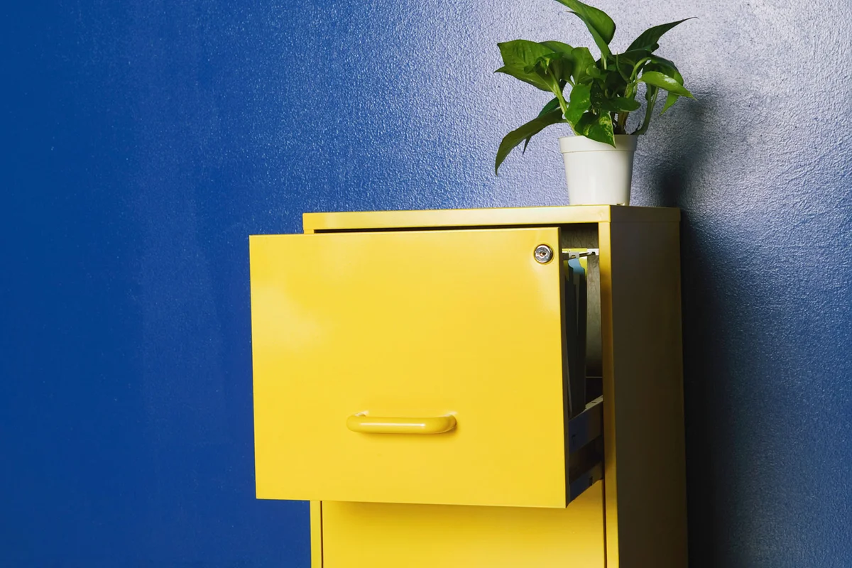yellow file cabinet to organize sewing supplies