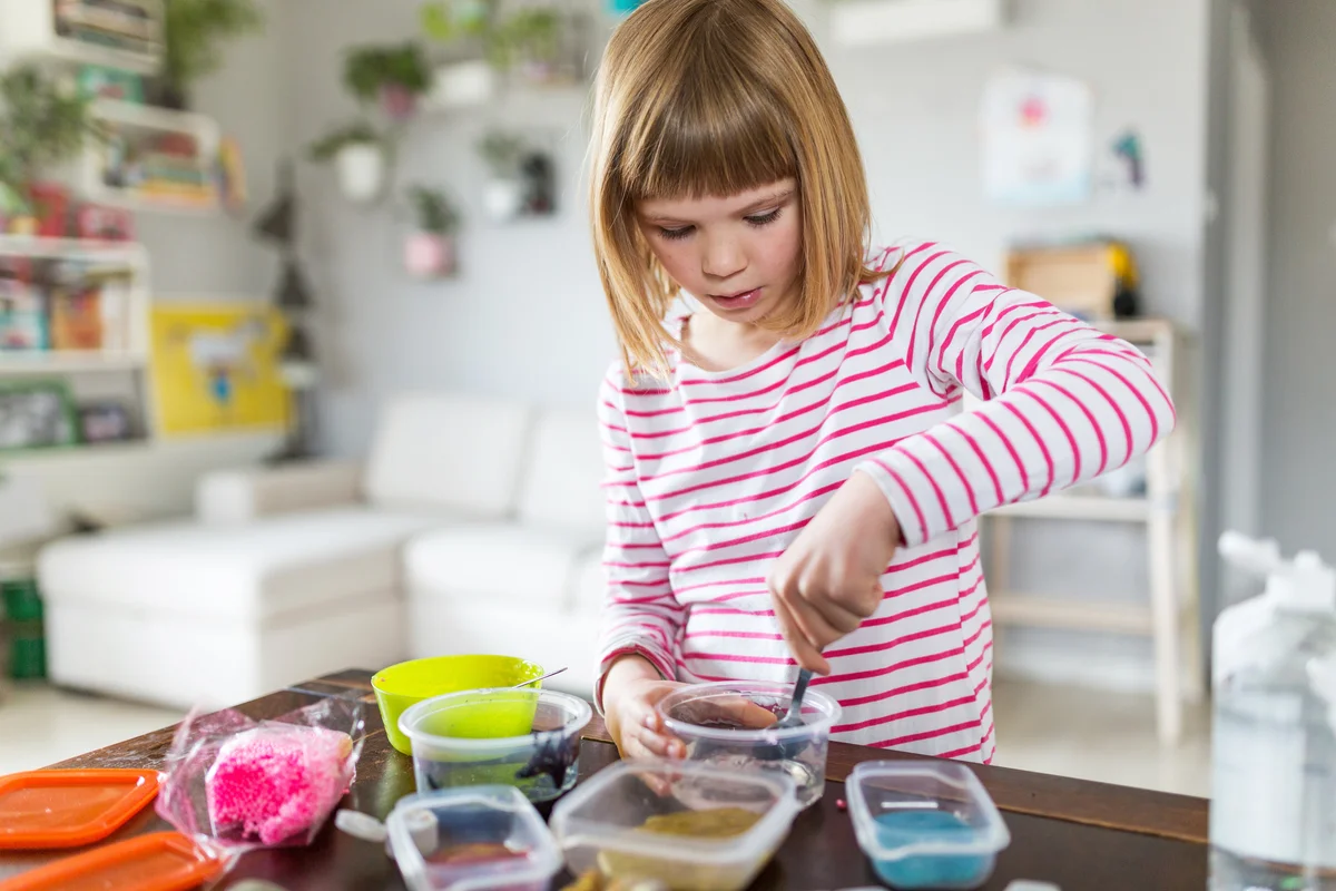girl doing science project