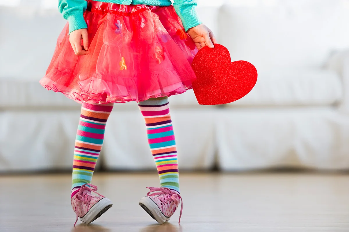 Young girl wearing colorful tights