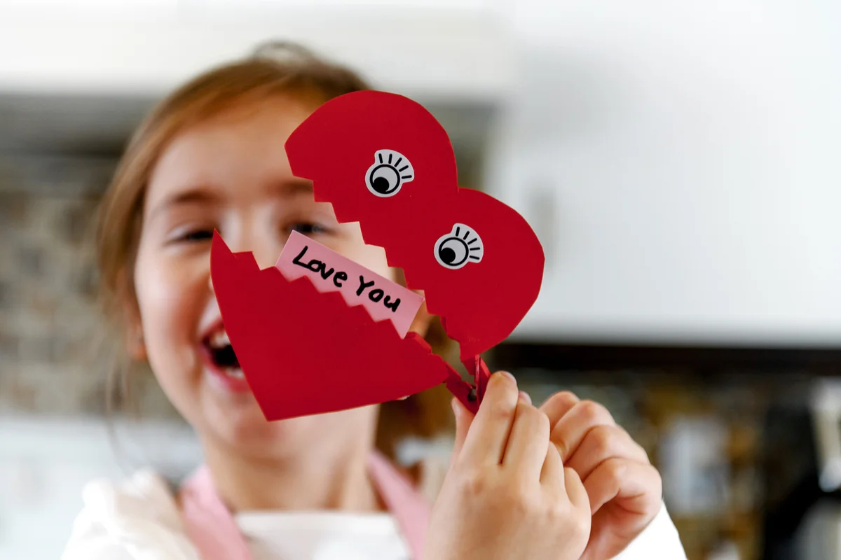 Girl making valentine's cards