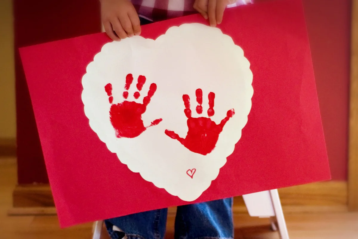 Hand print into heart shape