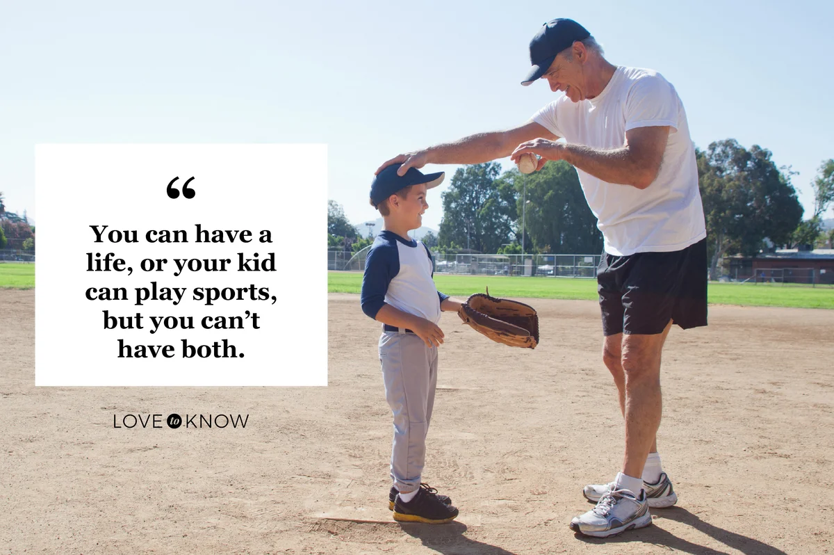 Father and son on baseball field