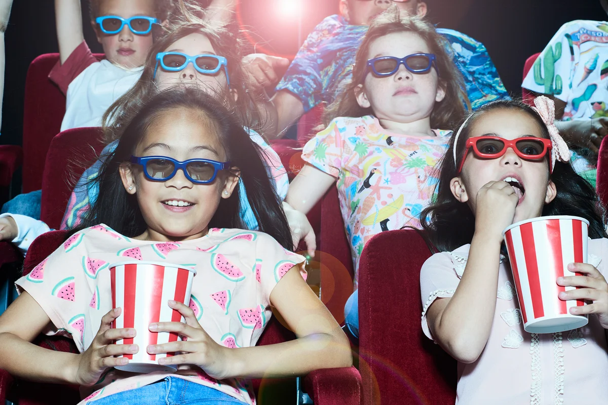 Group of children enjoying a movie