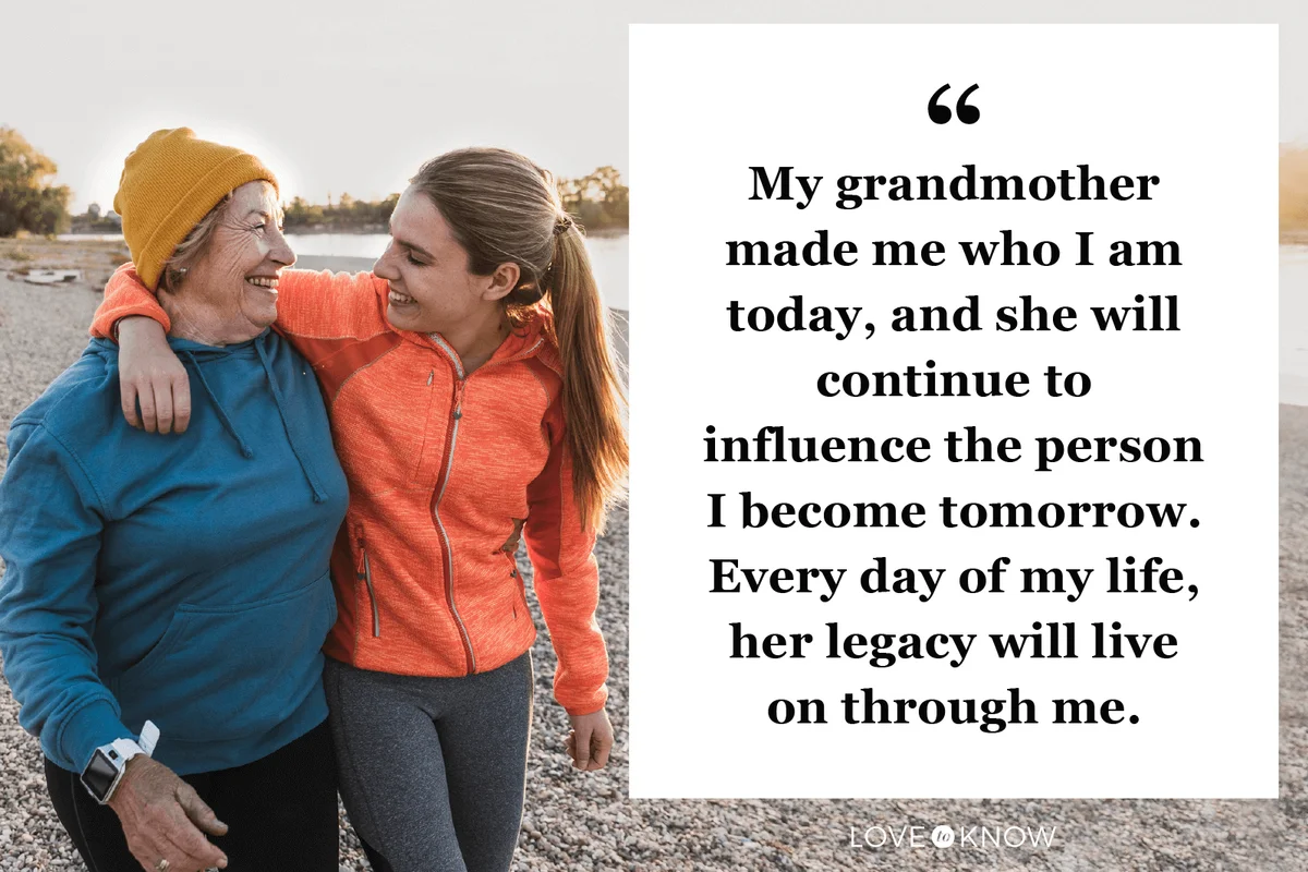 Fit grandmother and granddaughter walking at the river with arms around