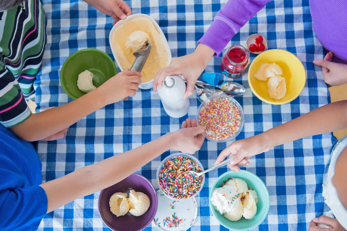 Children making ice cream sundaes