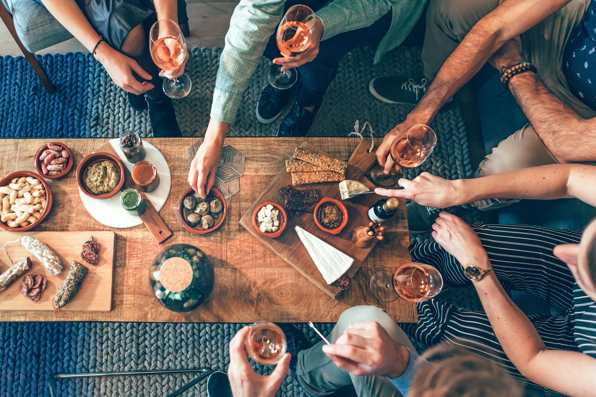 Family Having Food And Drink Wine