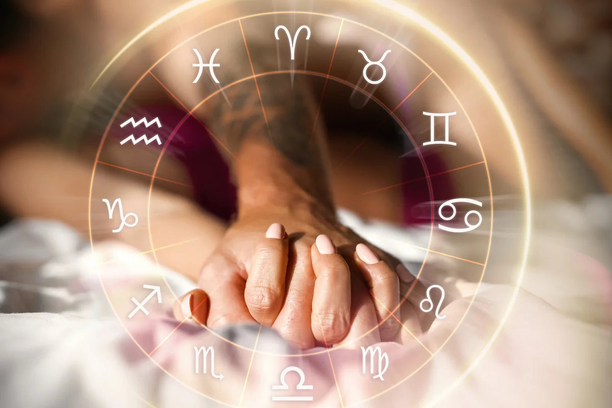 horoscope signs couple holding hands