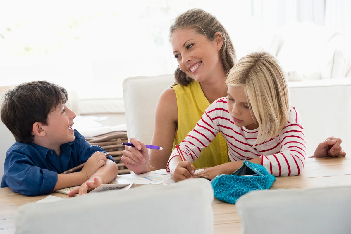 mother and children playing word game