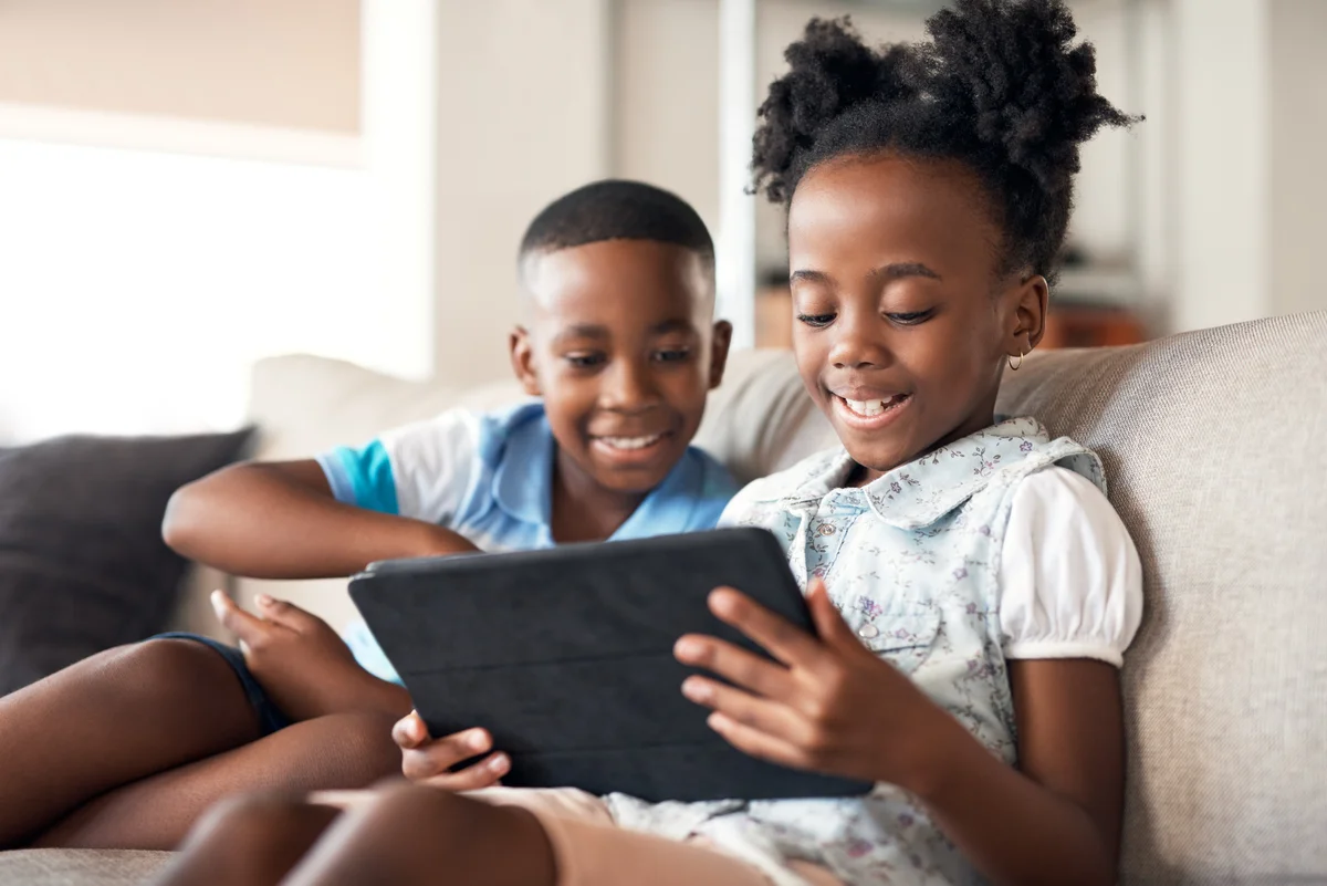 children playing word games on tablet
