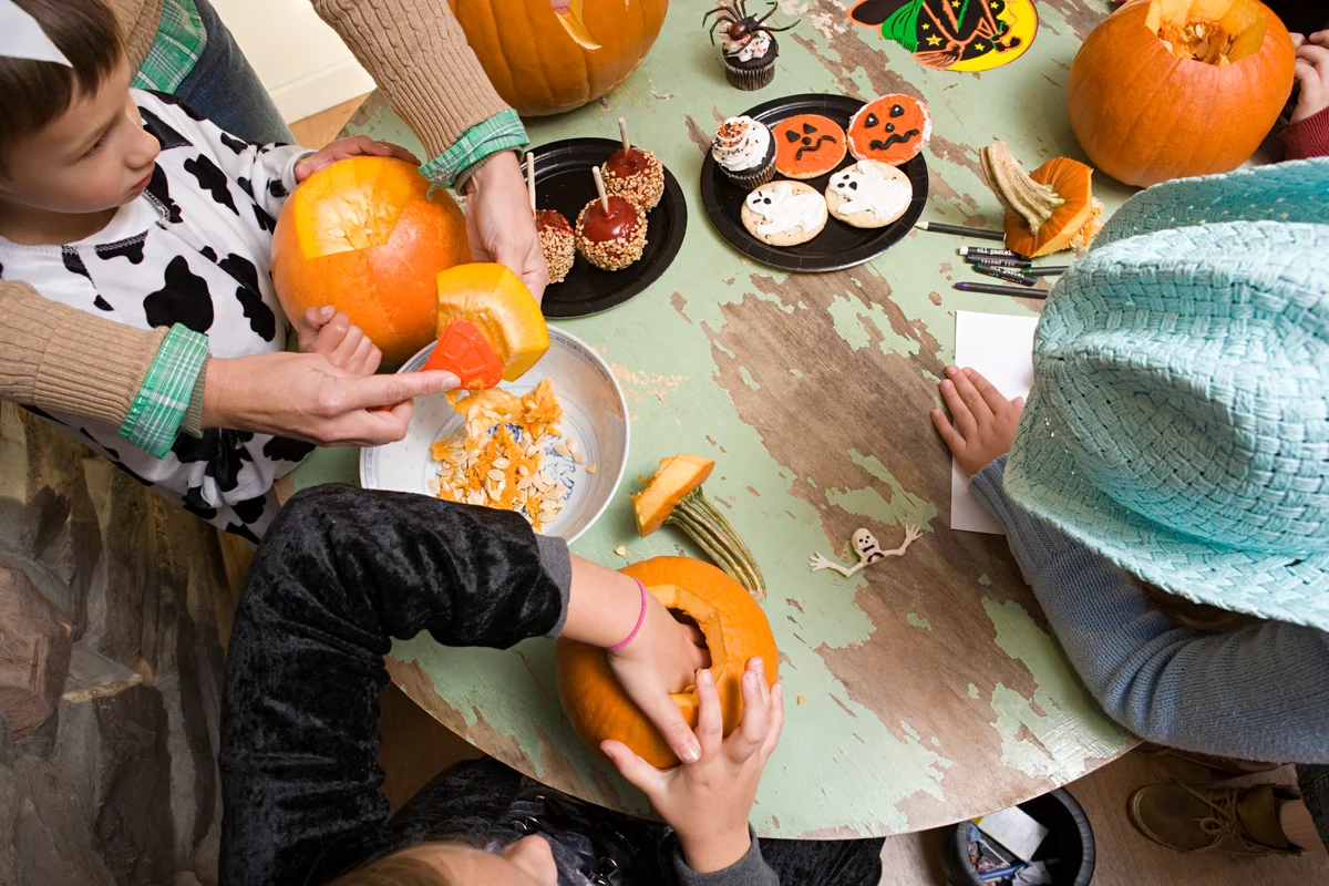 carving pumpkins at birthday party