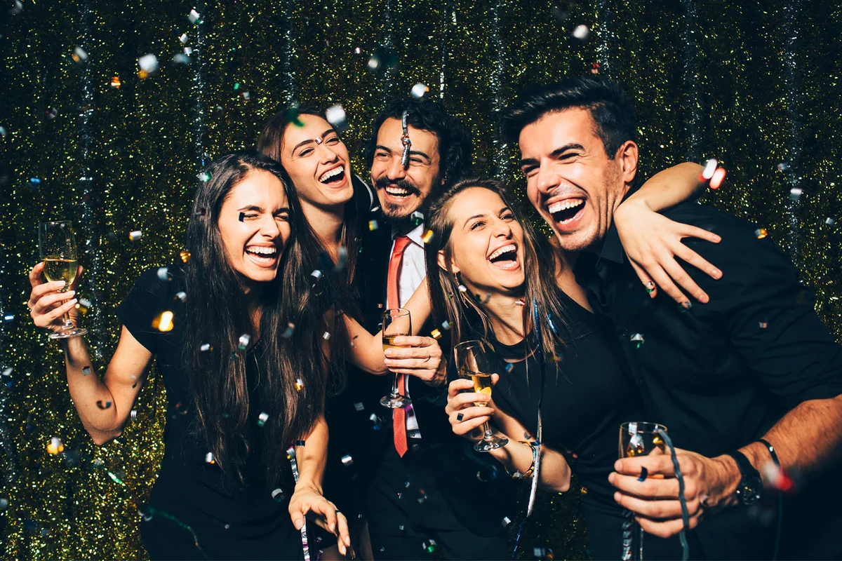 friends dancing at a party on New Years Eve
