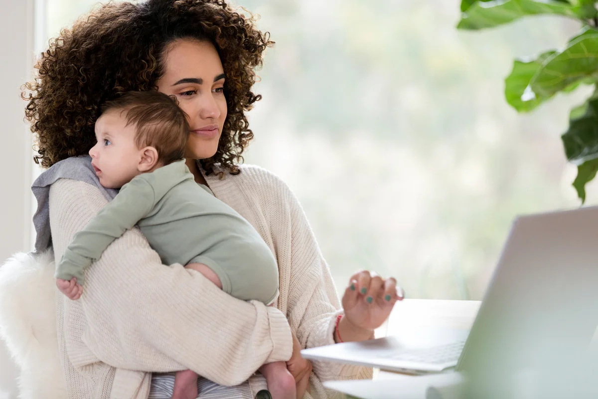 mom working from home with baby