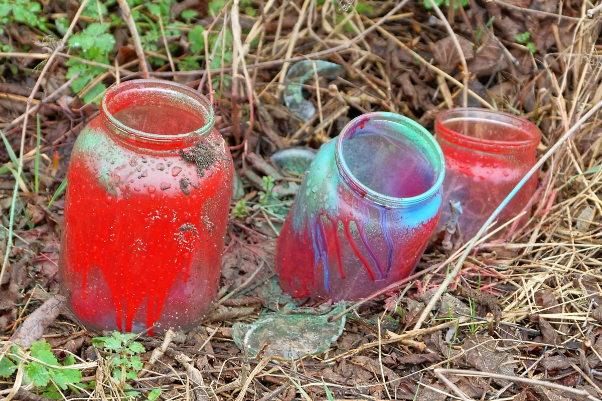 Glass jars in red and blue paint