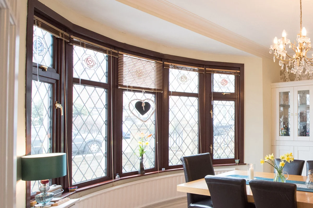 living room with large leaded glass windows