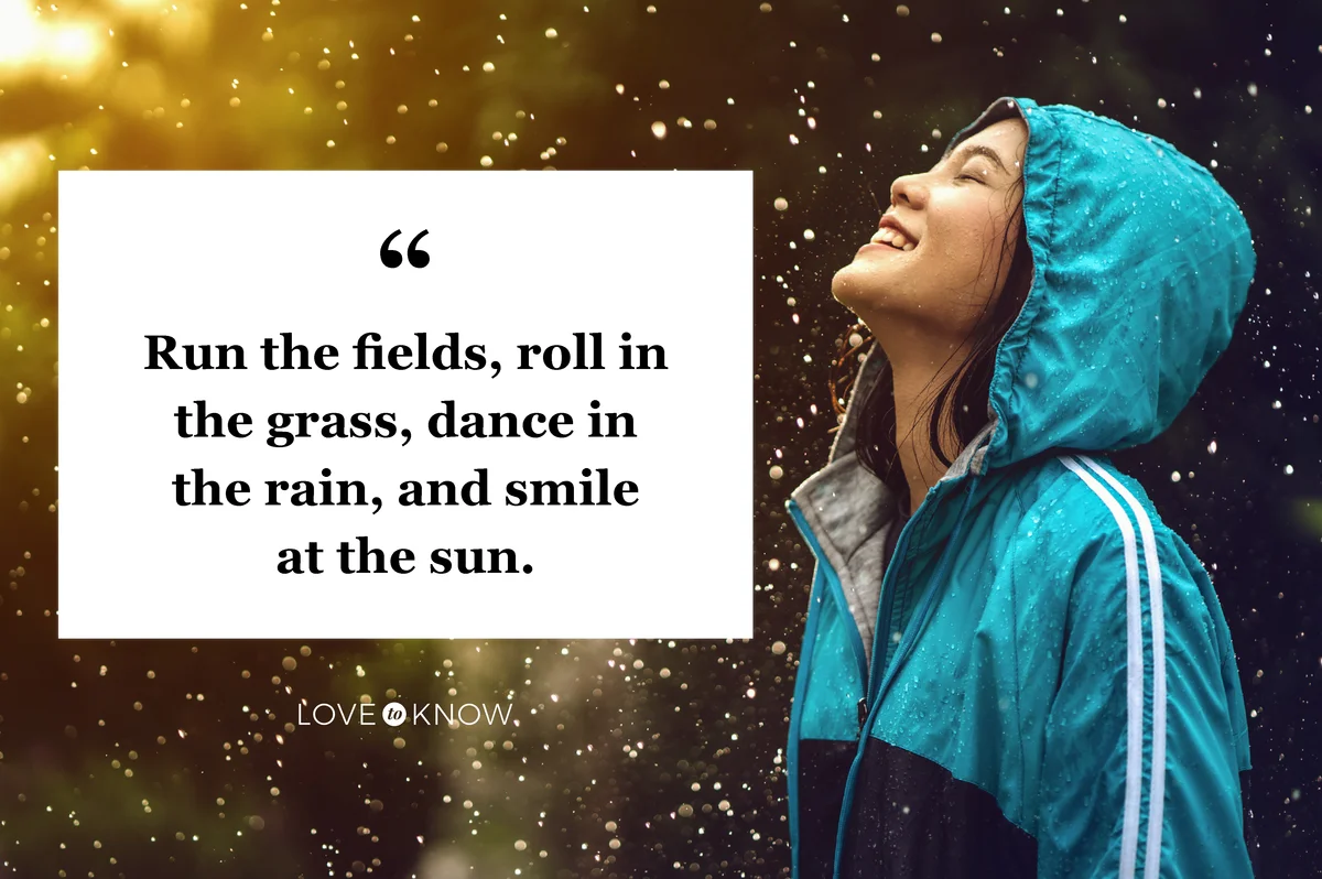 Woman wearing a raincoat outdoors in the rain