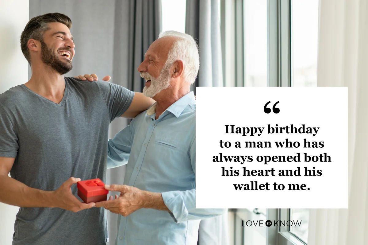 adult son giving his father a birthday gift