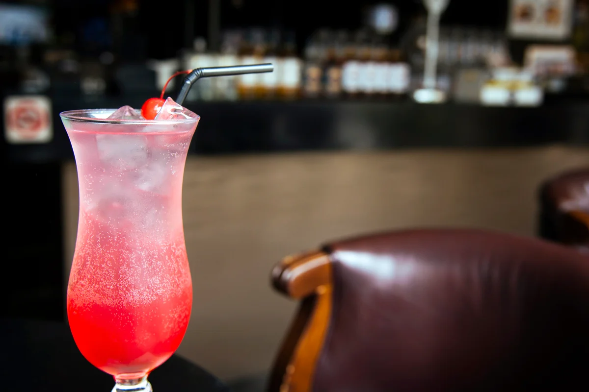 Singapore Sling cocktail with a cherry on top